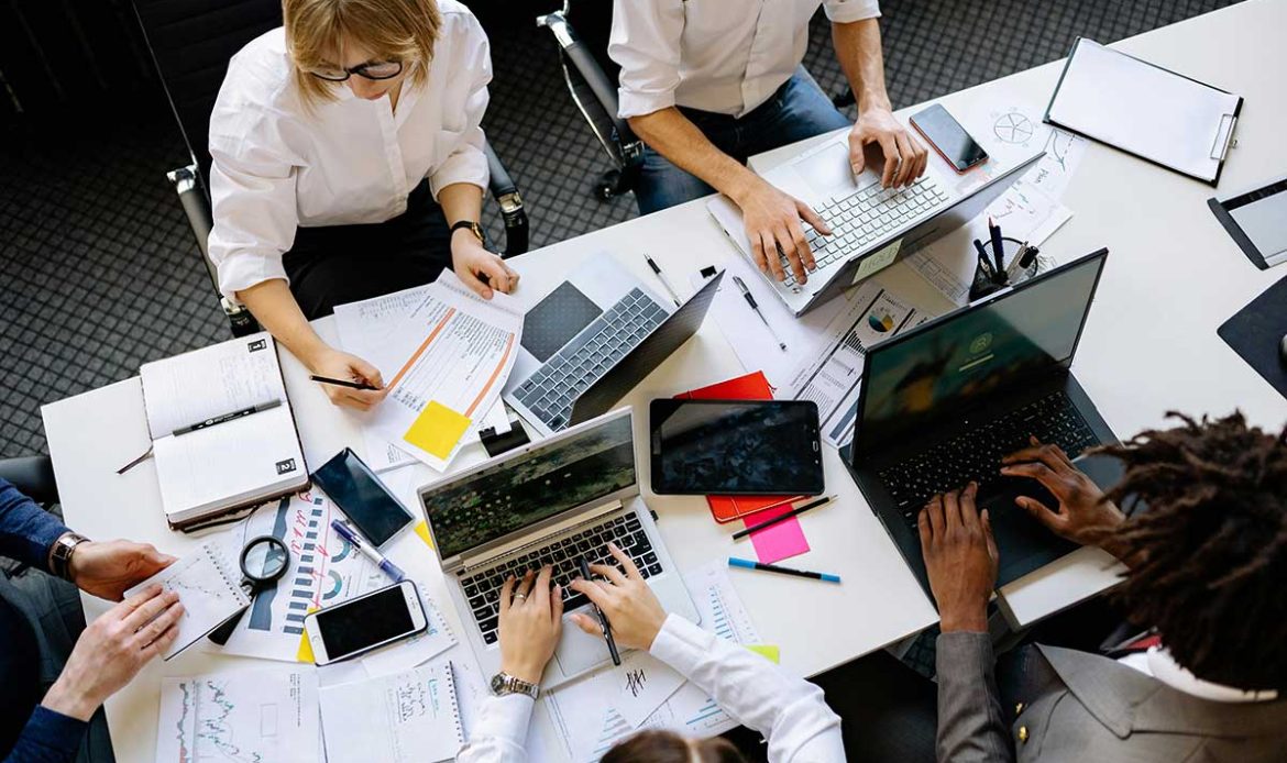 professional SEO Services team discuss client campaign implementation